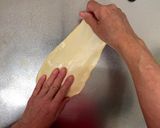 A picture of step 5 of Onion Bread (How to make super easy thinnest dough no-rolling pin).