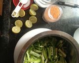 A picture of step 2 of Green chilli pickles.