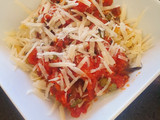 Pasta in spicy chorizo tomato sauce with capers
