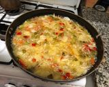 A picture of step 6 of Spanish Potato Omelette with Onion and Peppers.