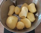 Une image de l'étape 1 de Colombo de merlu pommes de terre tomates au Cook Expert.