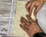 Foto del paso 3 de la receta: Trenza de hojaldre de tarta de queso y arándanos