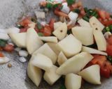 A picture of step 3 of Aloo cholai Amaranth.