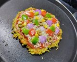 A picture of step 5 of Maggi Pizza.