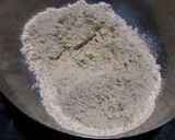 A picture of step 2 of बेसन घालून सिमला मिरचीची भाजी (Besan Shimla Mirchichi Bhaji Recipe In Marathi).