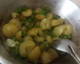 A picture of step 3 of Stir fried amla and green chillies.