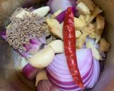 A picture of step 3 of Nadia Bara Tarkari (Coconut dumplings curry).
