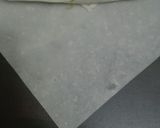 A picture of step 9 of Chicken Roll.