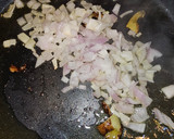 Foto del paso 7 de la receta: Fideos guisados con alcachofas, espárragos y chirlas