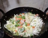 A picture of step 1 of Mix frozen vegetable without onion garlic.