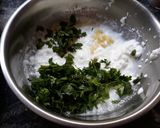 A picture of step 16 of Pita Bread Chick Pea Kidney bean filling with Tzatziki sauce.