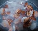 A picture of step 1 of Clam with garlic black bean paste.