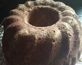 A picture of step 12 of Apple bundt cake with flaked almonds.