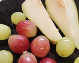 A picture of step 1 of Sliced 🍐 and grapes with walnuts. Healthy Juicy snack.