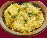 A picture of step 5 of Coconut Pulao (coconut pilaf).