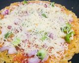 A picture of step 6 of Maggizza.