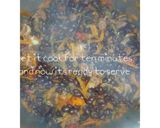 A picture of step 7 of Fried black beans (njahi).