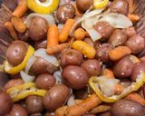 A picture of step 7 of Roasted Potatoes 🥔 and Baby Carrots 🥕with Lemon 🍋.