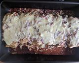 A picture of step 5 of Enchiladas with black bean mole.