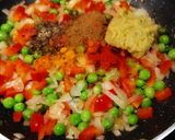 A picture of step 3 of Shakshuka (In my style- Poached eggs in tomato and veggie gravy).
