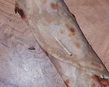 A picture of step 11 of Chicken Roll.