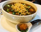 A picture of step 14 of Whosayna’s Chicken Manchow Soup topped with Manchurian balls.