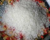 Foto del paso 3 de la receta: Arroz salteadito con pollo
