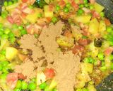 A picture of step 2 of Aloo,muttor with boiled egg.