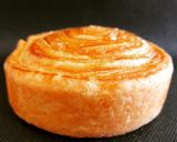 Foto del paso 18 de la receta Espiral de hojaldre relleno de crema de melocotón y chocolate