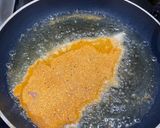 A picture of step 4 of Chicken Milanese.