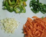 A picture of step 2 of Fried rice with chicken fried.