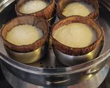 A picture of step 4 of Coconut shell Idli.