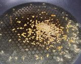 A picture of step 3 of Arroz con pechuga de pollo.