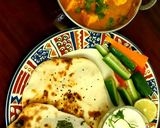 A picture of step 7 of Paneer Angara (No onion and garlic) with Naans.