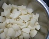 A picture of step 2 of Aloo tamatar.
