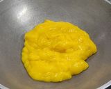 A picture of step 2 of Layered mango lassi.