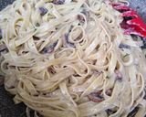 A picture of step 5 of Tagliatelle with Cream and Mushrooms.