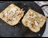 A picture of step 2 of Cheesy Garlic Bread toast.