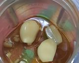 Foto del paso 4 de la receta: Aceite de ajo y ajíes P.P. (10 XL picante)