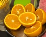 A picture of step 1 of Komola Pulao: Narangi/Orange Pulao/Rice.