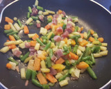 Foto del paso 2 de la receta: Arroz salteado al pimentón con verduras y jamón