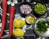 A picture of step 1 of Red Carrot, Peas and Potato Sabzi.