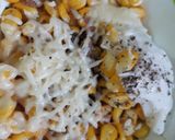 A picture of step 6 of Cheezy corn.