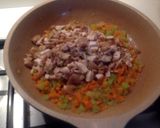 A picture of step 3 of Spaghetti with Rabbit Ragù, Mushrooms, and Walnuts.