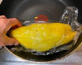 A picture of step 4 of Omu Sandwich (Sandwich wrapped with egg fry).