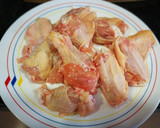 Foto del paso 2 de la receta: Arroz Nomen con alas de pollo, bimi y alcachofas