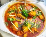 A picture of step 13 of Chicken Cinnamon Karhai.
