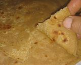 A picture of step 13 of Lacha Dar Paratha in layers of three kind.