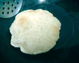 A picture of step 4 of Puffy Milk poori.