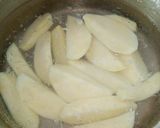 A picture of step 3 of Potato Masala Wedges.